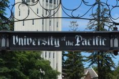 University of the Pacific archway sign with Burns Tower in background